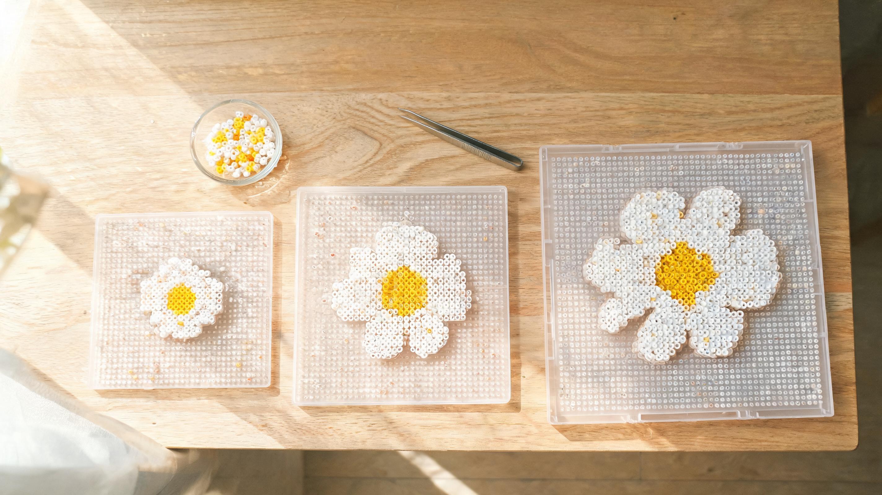 Small, medium, and large bead grids of the same flower